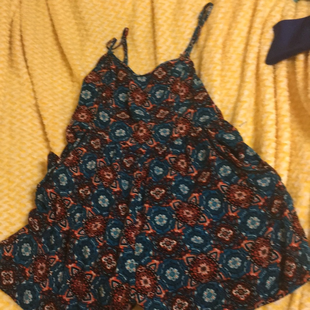 blue romper with designs